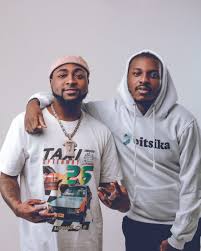 David "Davido" Adeleke (L) and Atsu Davoh (R)